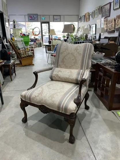 Vintage upholstered Accent Chair with carved details