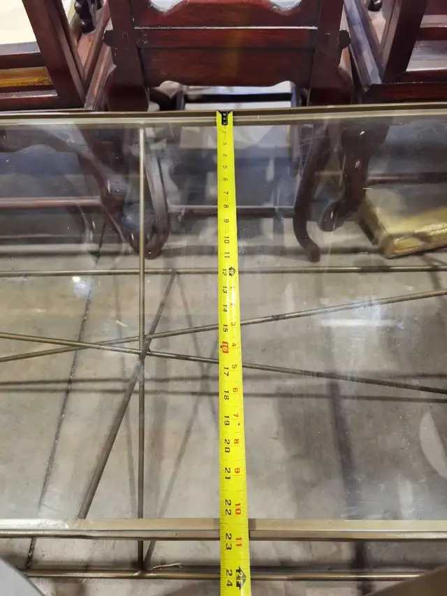 Glass top, metal frame coffee table
