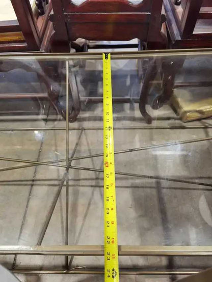 Glass top, metal frame coffee table