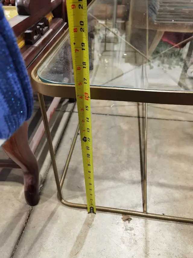 Glass top, metal frame coffee table