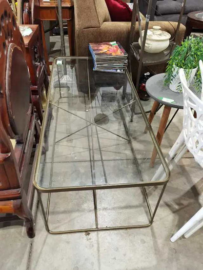 Glass top, metal frame coffee table