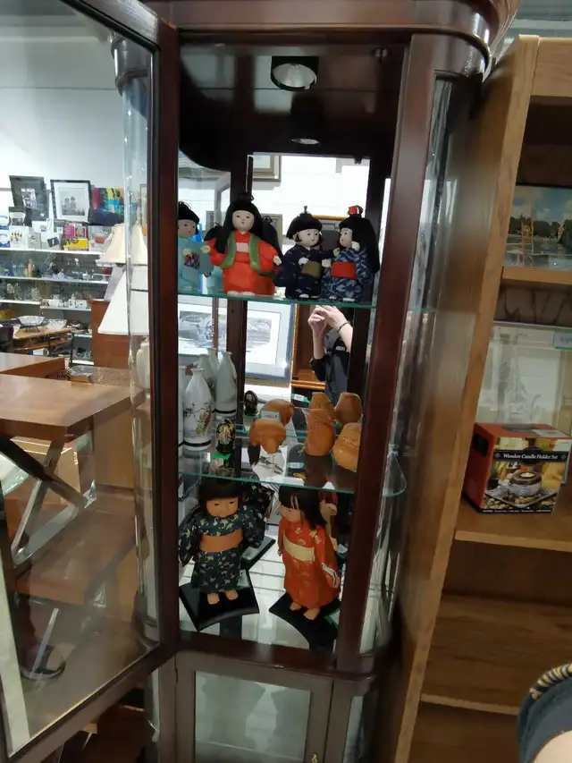Darkwood Curio Cabinet with glass shelves and light