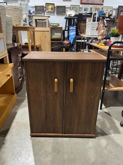 Butterfly Door Cabinet