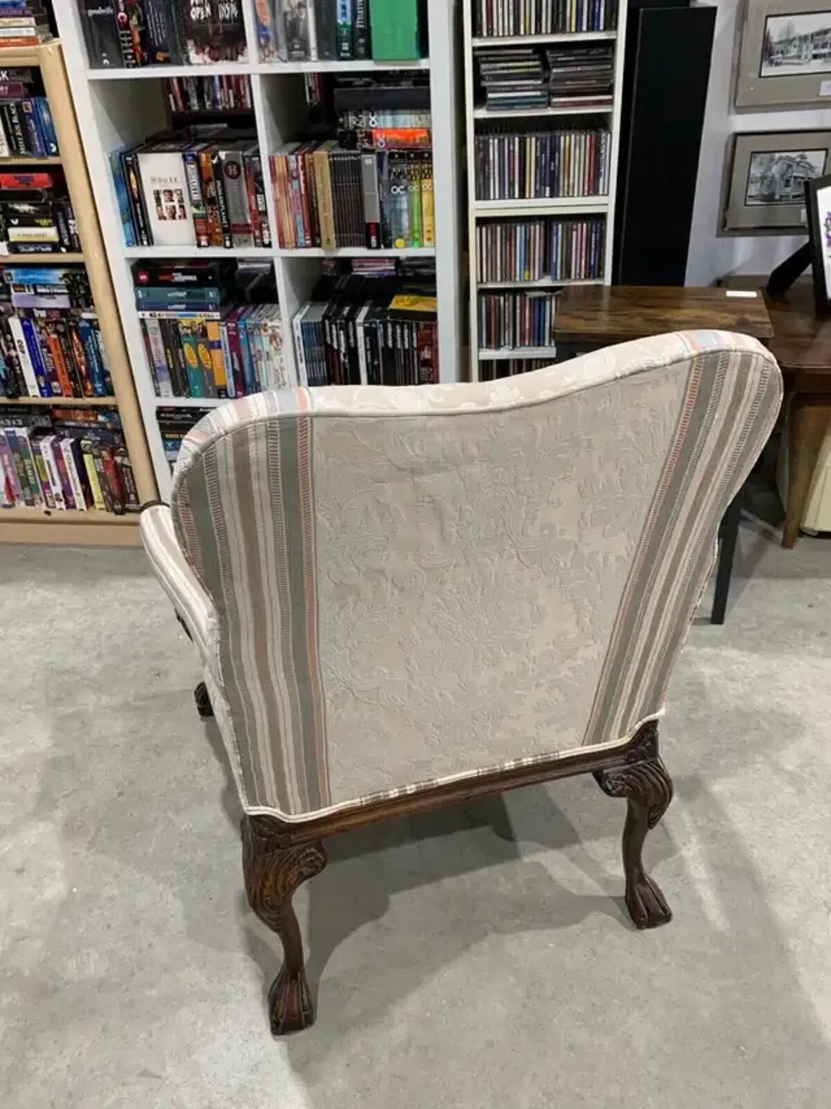 Vintage upholstered Accent Chair with carved details