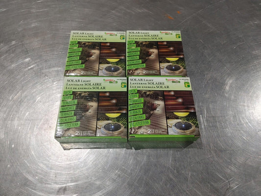 Brand New in Box Lot of 4 Solar Yard Lights Silver