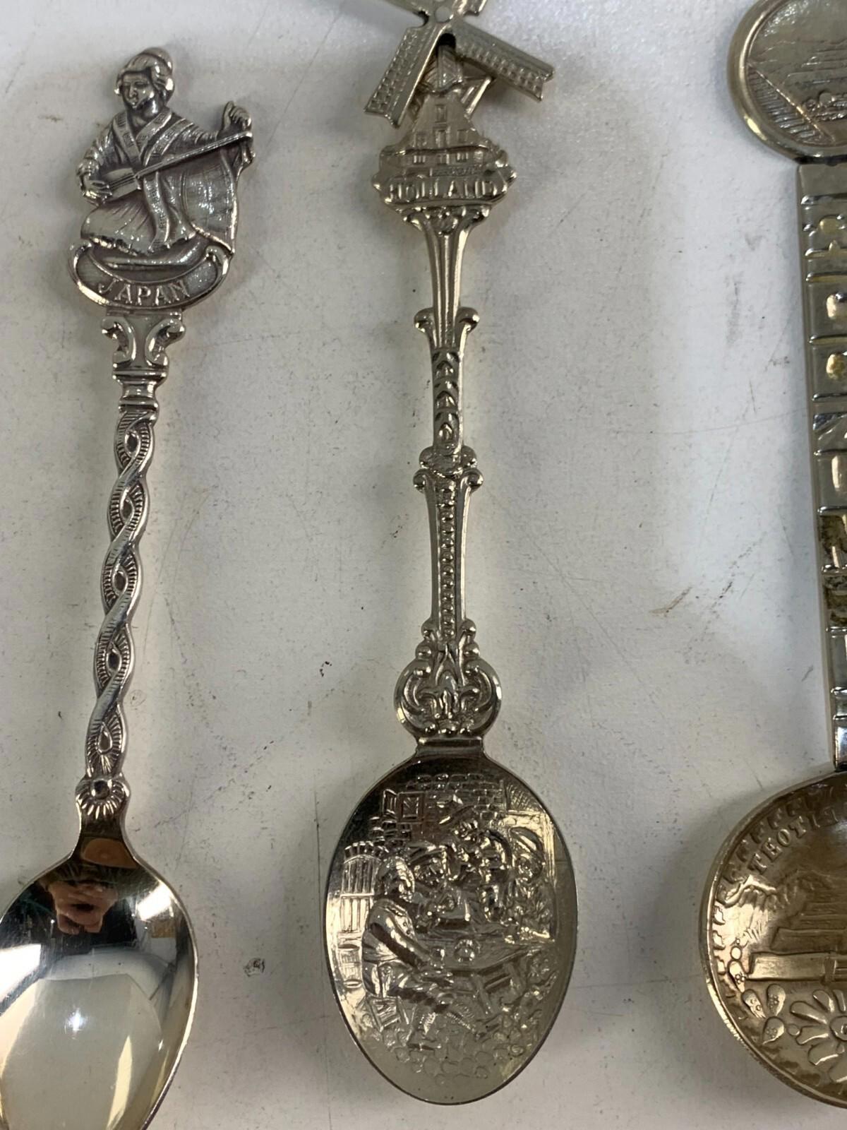 Lot of 5 Collector/souvenir spoons