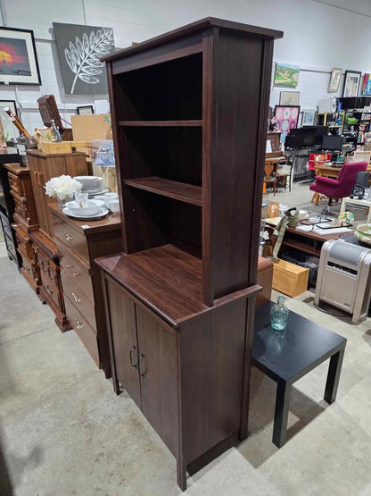 IKEA BRUSALI High Cabinet with Doors in Brown.