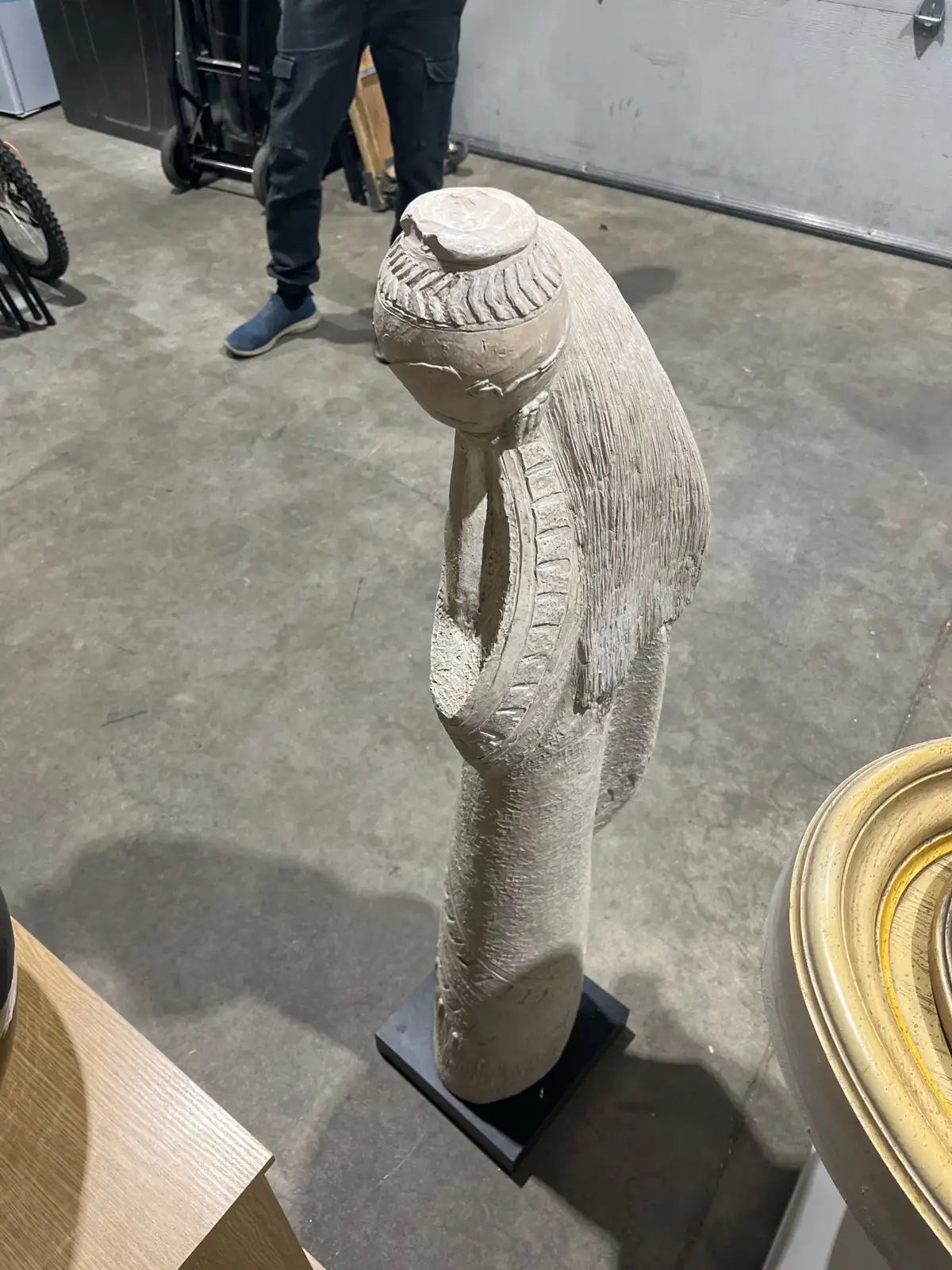 Statue of the woman with a pitcher