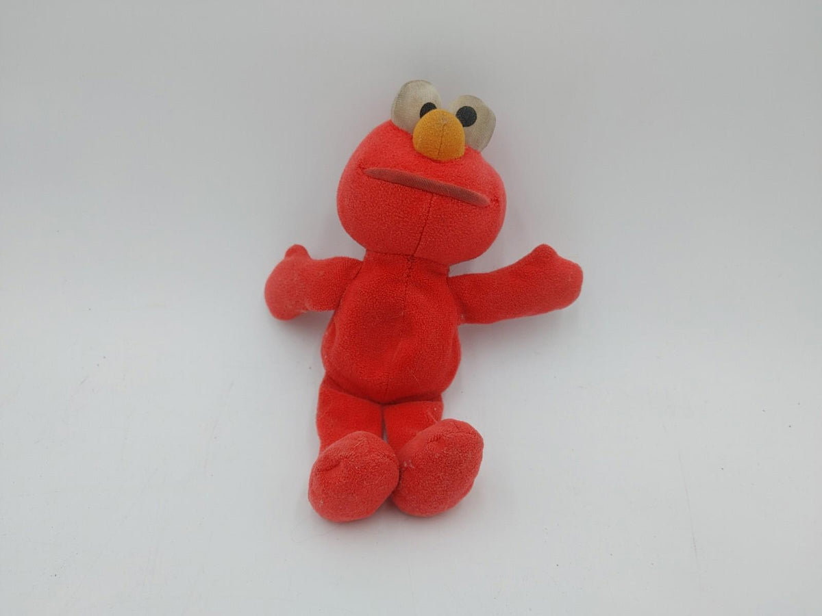 Jouet peluche miniature vintage Elmo rouge en bon état