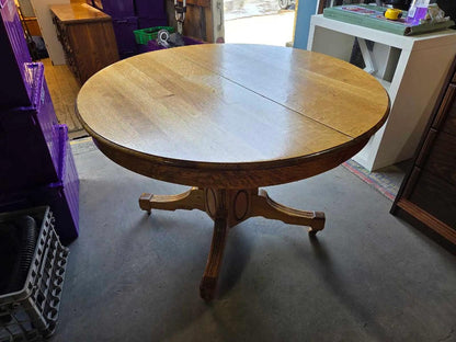 Round Oak Rolling Dining Table
