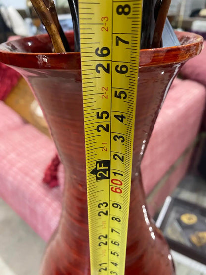 Red Vase with Decorative Twigs
