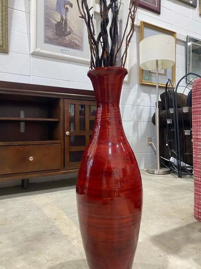 Red Vase with Decorative Twigs