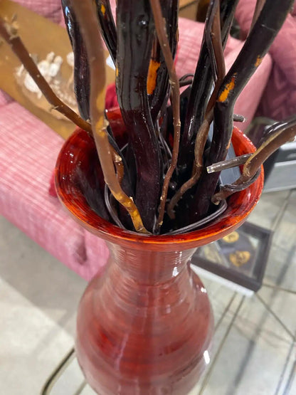 Red Vase with Decorative Twigs
