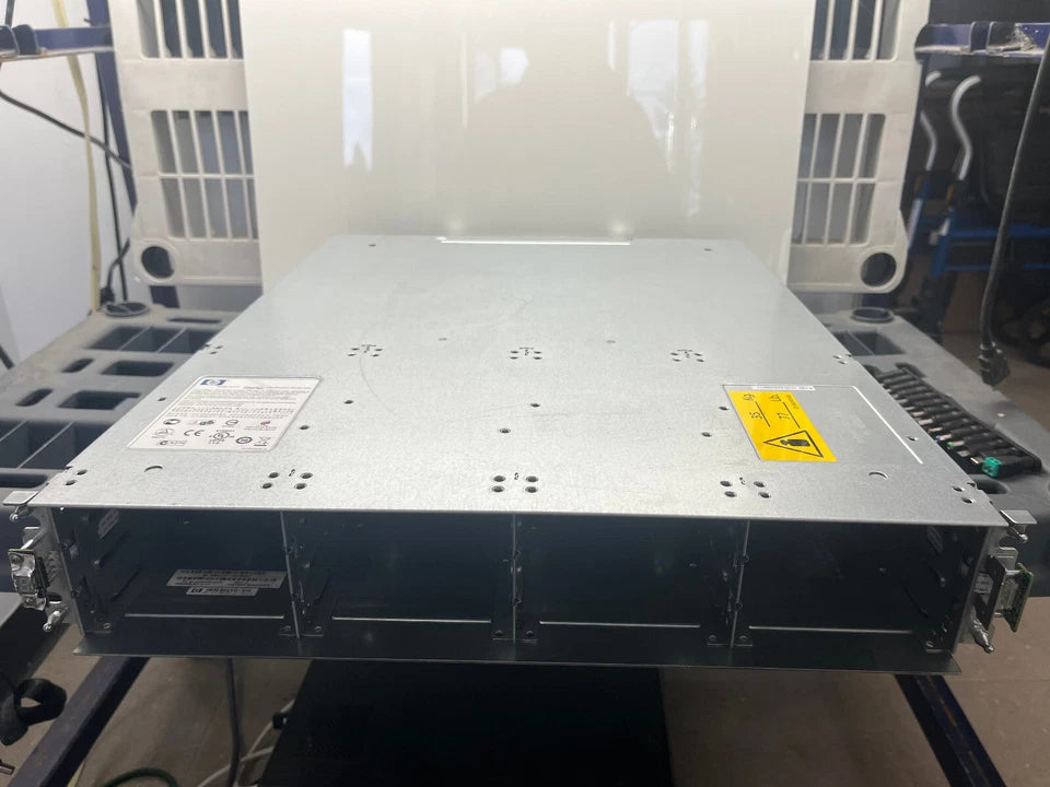 GOOD CONDITION HP StorageWorks AJ750A Chassis + 2x AJ751A I/O Modules + PSUs